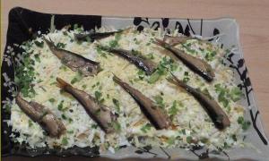 The most delicious salad with sprats and potatoes Sprats salad with cheese